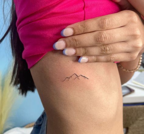 Dainty Tattoos Mountains, Mountain Side Tattoo, Rib Mountain Tattoos For Women, Dainty Mountain Tattoo Simple, Mountain Life Tattoo, Coors Mountain Tattoo, Tattoos For Mountain Lovers, Rib Cage Mountain Tattoo, Andes Mountains Tattoo