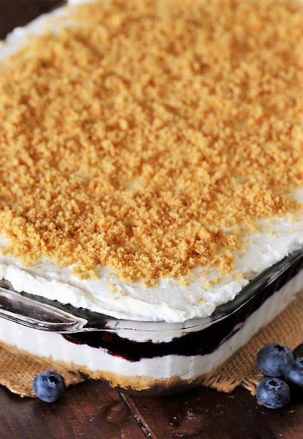 No-Bake Blueberry Yum Yum in Baking Dish Image Blueberry Yum Yum Recipe, Yum Yum Recipe, Amaretto Cheesecake, Blueberry Yum Yum, The Kitchen Is My Playground, Pumpkin Cream Pie, Blueberry Desserts Recipes, Blueberry Cheesecake Recipe, Comfort Food Desserts