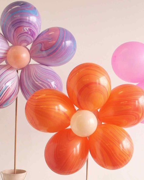 Floral Balloon Bouquet | Martha Stewart Living - Skip the traditional floral arrangements and spruce up your event space with bouquets of balloon blooms-on-a-stick that double as fun props for photos. Balloon Sticks Ideas, 21 Balloons, Paper Girls, Deco Ballon, Grown Up Parties, Floating Balloons, Hippie Birthday, Event Decorating, Sprinkle Party