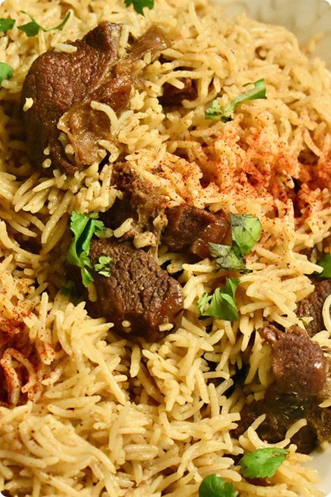 Can you believe that making a one-pot mutton yakhni pulao for your next desi dinner is possible? If you've always wanted to learn this traditional food recipe prepared with gosht and basmati rice, then you're in the right place. Use this guided step-by-step recipe with pictures and make the best and easiest pilau for your next Sunday dinner, Iftar, or Eid. Get this one-pot mutton yakhni pulao recipe at untoldrecipesbynosheen.com and cook the ultimate comfort food! Desi Dinner, Mutton Yakhni, Mutton Pulao, Yakhni Pulao, Pulao Rice, Pakistani Recipes, Goat Meat, Pulao Recipe, Cup Of Rice