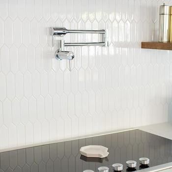 White Oval Kitchen Backsplash Tiles Design Ideas Glossy White Subway Tile Kitchen Backsplash, Picket Mosaic Tile Backsplash, Picket Fence Tile Backsplash, White Picket Backsplash Kitchen, Wooden Kitchen Hood, White Picket Tile Backsplash, Picket Tile Backsplash, Oval Tile, Kitchen Backsplash Tile Designs