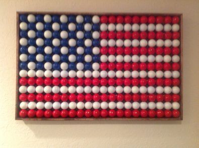 American flag made of painted golfballs  (35 blue) (35 white+40 white+60 white) (40 red+60 red)  (35 blue+135 white+100 red=260 total) Golf Crafts, Golf Birthday Gifts, Golf Ball Gift, Golf Ball Crafts, Golf Diy, Golf Decor, Golf Art, Golf Mk4, Golf Birthday