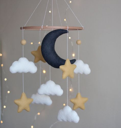 Hanging felt mobile with moon ,  stars and clouds . Best present for your new child or for a baby shower.The parts could be changed and a completely new one can be added. All toys are specially designed and handmade for bringing color and tenderness to the Baby's Room. Made with eco-friendly polyester felt and wool blend felt of the highest quality.Individual design is possible.  You can request your preferred palette color if item doesn't match your nursery. Just ask me if you want to change an Moon Crib, Stars Baby Mobile, Baby Mobile Felt, Diy Baby Mobile, Mobile Crib, Moon Nursery, Star Mobile, Moon Baby, Baby Room Inspiration