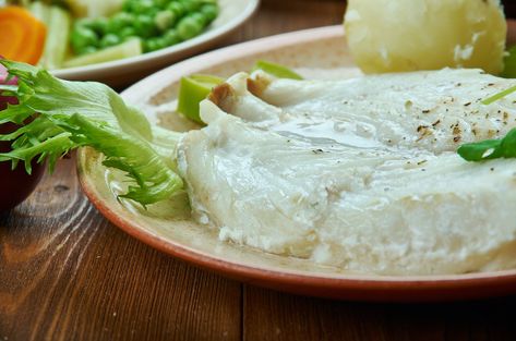 Why We Keep Eating Lutefisk in Minnesota | Minnesota Monthly Lutefisk Recipe, Norwegian Waffles, White Sauce Recipe, Norwegian Cuisine, Raise Eyebrows, Meat Cake, White Sauce Recipes, Salmon And Shrimp, Norwegian Food