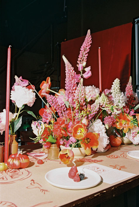 Tomato Candles, berry candles and hand painted table designs | wedding table scape inspiration   Workshop & photographer: @zarastaplesweddings Venue: @candelabar Menus & table painting: @broganscottstudio Florist: @isadiafloral Candles: @poppyandsagenz Cake: @neat.cakes Summer Floral Arrangements Wedding, Organic Floral Arrangements, Maximalist Wedding Decor, Funky Wedding Decor, Moody Summer Wedding, Dining Photography, Tomato Candle, Wedding Table Scape, Maximalist Wedding