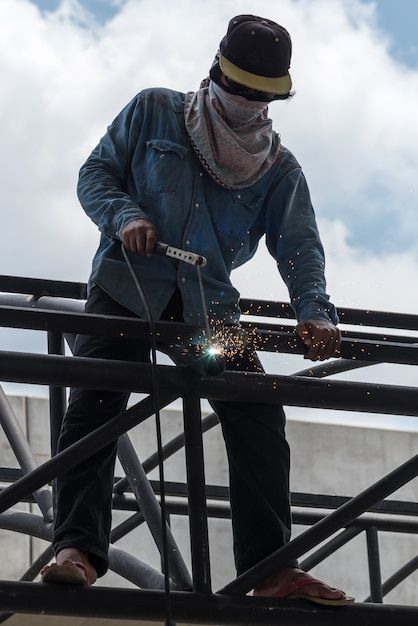 Photo worker welding the steel part | Premium Photo #Freepik #photo #welder #welding #metal-work #construction-work Sheet Metal Worker, Steel Photography, Steel Worker, Metal Workers, Construction Work, Oil Rig, Metal Work, Sheet Metal, Premium Photo