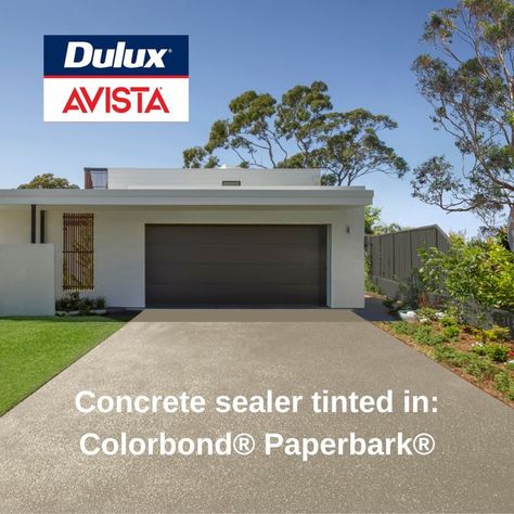 Did you know you can match your concrete driveway to your steel roof or fence – while sealing the concrete for lasting good looks? Dulux Avista now offers four Colorbond® Sealer Tints. Choose from bold and trendy Monument®, timeless Woodland Grey® or the coastal vibes of Shale Grey™ and Paperbark®. Sealers are essential to keep concrete looking good for longer, but why not add some serious style at the same time? This is a fast, affordable way to create a cohesive look for your home's exterior. Plain Concrete Driveway, Driveway Paint Colors, Coloured Concrete Driveway, Concrete Driveway Sealer, Driveway Paint, Cement Driveway, Aggregate Driveway, Colorbond Roof, Cement Render