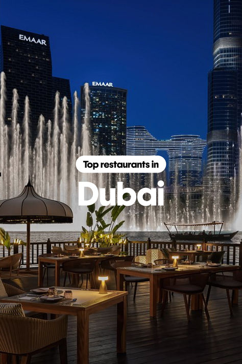 Image of a restaurant with a view of the Dubai fountains with overlay text that says, "Top restaurants in Dubai." Dubai Restaurant Luxury, Restaurants Dubai, Dubai Restaurant, Restaurant In Dubai, Restaurants In Dubai, Christmas Markets Germany, Dubai Travel Guide, Germany Christmas, Christmas Markets