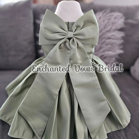 Gorgeous, Olive Green Satin Flower Girl Dress (Various Colours) - Wedding, Communion, Baptism, Party DressBridesmaid Dress - Wedding This beautiful Olive Green satin dress is available in a variety of colours. A simple but elegant dress in a satin feel fabric (polyester) with a bow on the front, and a large bow n the back that can detach. The back is zip up. #flowergirldress #flowergirl #olivedress #satindress #sagegreendtesd #partydress #birthdaydress #fyp #fypviral free #etsyshop #e... Olive Green Satin Dress, Wedding Communion, Green Satin Dress, Satin Flower Girl Dress, Princess Flower Girl Dresses, Puffy Dresses, Olive Dress, Baptism Party, Satin Flowers