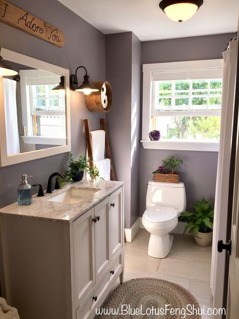 Stunning Farmhouse rustic bathroom with Sherwin Williams Gris Morado paint. #farmhouse #bathroom #grismorado #sherwinwilliams #IWANT https://www.sherwin-williams.com/homeowners/color/find-and-explore-colors/paint-colors-by-family/SW9156-gris-morado Bathroom Purple And Grey, Purple Bathroom Color Schemes, Gris Morado Sherwin Williams, Lavender Grey Bathroom, Purple And Grey Bedroom Ideas Master Bathrooms Color Combinations, Farmhouse Purple Paint, Purple Farmhouse Bathroom, Purple And Brown Bathroom, Sherwin Williams Purple Gray