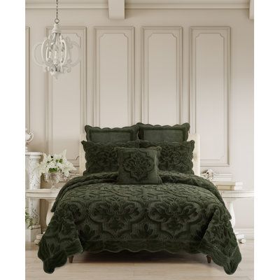 The Aaban Evergreen Quilt Set that is crafted from a irresistibly soft plush fabrication. The unique medallion design is tufted and quilted which gives a stunning dimensional surface appearance and the velvet reverse offers cozy warmth. The included coordinating sham shams are reversible finished with a hidden zipper closure for easy removal and care. Finished with a lovely scalloped edge border, adding yet another beautiful layer of detail. The fabrication is versatile to use for the Holidays o Solid Quilt, Queens New York, Green Throw Pillows, Quilted Sham, Medallion Design, Quilt Set, California King, Quilt Sets, Square Quilt