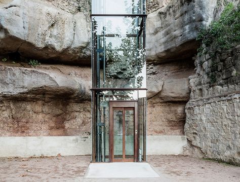 Gironella Elevator by Carles Enrich Modern Eco House, Stair Elevator, Eco House Design, Old Brick Wall, Oil Platform, Glass Lift, Elevator Design, Glass Elevator, Stadium Design