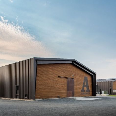 Product: Kebony Clear Passive Rainscreen System - **Kebony on the warehouse only**
Architect: Graham Baba Architects
Builder: Rimmer & Roeter (Quincy Warehouse)
Photography: Kristian Alveo
Location: Quincy, WA Warehouse Design Architecture, Warehouse Photography, Warehouse Architecture, Pre Engineered Metal Buildings, Warehouse Project, Garage Design Interior, Wood Decking, Garage Guest House, Factory Architecture