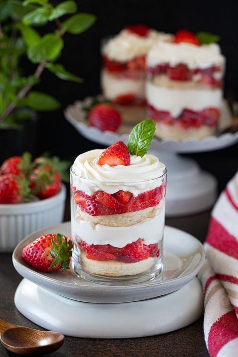 Whip up these fabulous Strawberry And Cream Trifle Cups, and you don’t have to look any further to create something that puts a smile on your loved ones’ faces. #strawberrydessert #strawberryshortcakecups #shortcakcups #valentinedessert #strawberrytriflecups