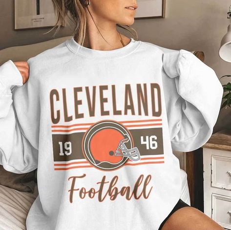 Vintage Cleveland Football Sweatshirt, Cleveland Football Comfort T-shirt, Cleveland Shirt, Browns shirt, Browns Hoodie Vintage. With our wonderful selection of shirts, you may uplift your outfit. Our shirts, which are made of high-quality fabrics, provide unmatched comfort and timeless style. Our custom fit shirts are ideal for any setting and are made to enhance your appearance and self-confidence. Our shirts are the height of adaptability, whether you're dressing up for a formal occasion or c Brown Hoodie, Football Sweatshirt, Brown Shirt, Light Blue Shirts, Trendy Graphic Tees, Cleveland Browns, Football Shirt, Classic Shirt, Cleveland