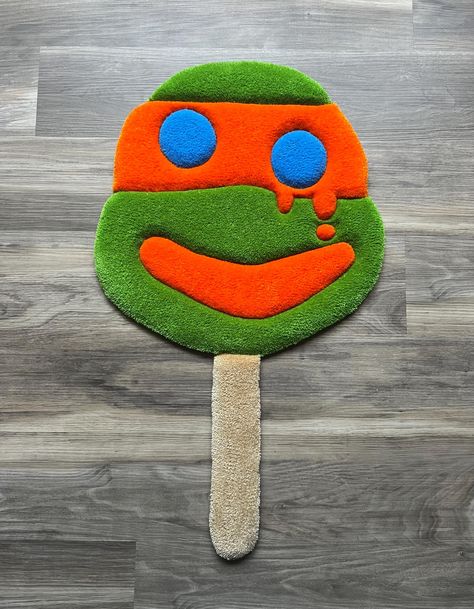 Handmade custom tufted Michelangelo Ice Cream! Made To Orders take about 7-14 days to be made and shipped out depending on size! Each tufted rug is carefully crafted and carved to perfection giving an almost 3D appearance that you can see and feel. Each piece is a luxury decor addition to the interior floors of your home.  Also an amazing gift for your family or friends! I specialize in creating custom rugs from any design such as Business logos, Faces, Animals, Etc. via photos and I also offer