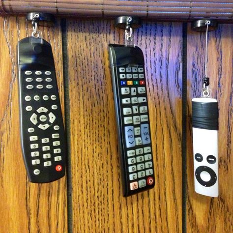 Never lose a remote! Tv Remote Holder Ideas, Tv Remote Holder Ideas Diy, Remote Holder Ideas, Tv Remote Holder, Small Kitchen Hacks, Remote Organization, Life Hacks Organization, Remote Control Storage, Remote Control Holder