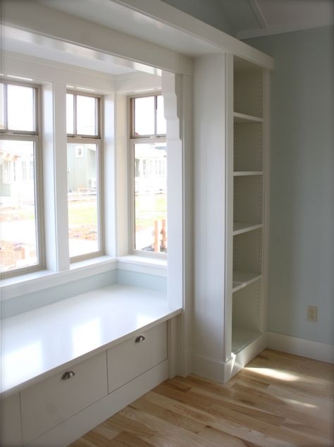 Simple window seat consists of a shelf with drawers below Built Ins Around Bay Window, Shelves Around Window Bedrooms, Bay Window Built In Shelves, Bay Window Shelves, Exterior Bay Window Ideas, Couch Under Window, Small Bay Window Ideas, Small Window Seat, Amber Kitchen