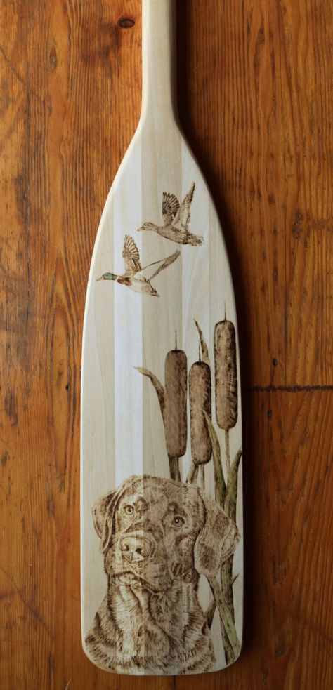 Wood Burned Canoe Paddle with Labrador Retriever | Wood burning crafts, Barn wood crafts, Wood burning art Leather Burning Ideas, Fishing Wood Burning, Simple Wood Burning Patterns, Canoe Paddle Art, Paddle Designs, Painted Oars, Painted Paddles, Wood Burning Tips, Canoe Paddles