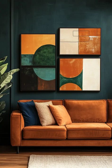 Modern living room with orange sofa and abstract geometric artwork on dark green walls. Copper Velvet Sofa, Cognac Living Room Ideas, Rust Couch Living Room, Tan Couch Decor, Rust Couch, Brown Couch Living Room Ideas, Living Room Chic, Couch Living Room Ideas, Brown Couch Living Room