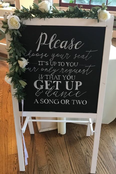 This open seating chalkboard sign welcomed guests to the reception. Open Seating Reception Sign, Matchmaker Seat At Wedding, Informal Reception Ideas, No Assigned Seating Wedding Reception, Wedding Open Seating Sign, Open Seating Wedding Reception, Reception Signs Entrance, Open Seating Wedding Sign, No Seating Plan Wedding Sign