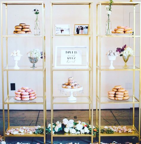 Wedding donut dessert display Miscellanea gold glass shelving Dessert Display Wedding, Donut Display, Glass Shelving, Gold Shelves, Glass Wall Shelves, Wedding Donuts, Donut Dessert, Burnt Orange Weddings, Dessert Bar Wedding