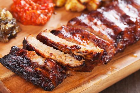 The secret to delicious, fall-off-the-bone BBQ baby back ribs is to bake them in the oven with a flavorful coating of Duke’s Mayonnaise, brown sugar, garlic, and spices prior to grilling. Try this easy recipe! Oven Roasted Ribs, Glazed Ribs, Ribs In Oven, Bbq Baby Back Ribs, Bbq Recipes Ribs, Garlic Herb Chicken, How To Cook Ribs, Baked Ribs, Barbecue Ribs