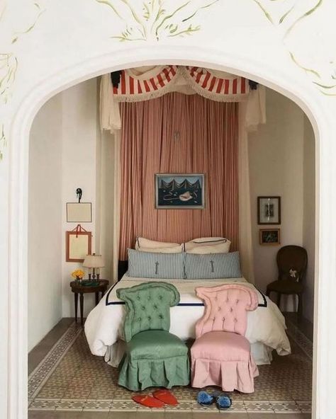 Audra Kiewiet de Jonge on Instagram: "I simply adore this bedroom by the artist and clothing designer Jorge Parra of @houseofbowsco. From the cartouche-back chairs upholstered in complementary colored moiré to the delicious mix of ticking stripes and the wall drawings reminiscent of Jean Cocteau’s at Santo Sospir, this room envelopes you in a warm hug of whimsy—charming you with its fresh take on historic form. I’d love to introduce a bit of mystery into this room with a quietly enigmatic work of art by the self-taught surrealist painter Gertrude Abercrombie. This painting that I’ve layered into Jorge’s beautiful room is a more complex version of one that I sold while the Head of Sale for Modern and Contemporary Art at Hindman—an enrapturing study of a shell and drapery that has held c House Room, Dream Rooms, Dream House Decor, Aesthetic Room Decor, Creative Home, House Inspo, Aesthetic Room, Decoration Table, New Room