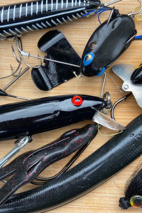 Forget that snazzy new holographic finish and fancy colors. Here’s why black lures catch so many fish in so many fisheries. Best Bass Lures, Striper Fishing, Custom Lures, Tackle Shop, Smallmouth Bass, Black Food, Night Fishing, Custom Paint Jobs, Trout Fishing