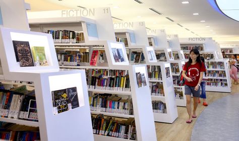 Yishun Public Library reopens with new digital zone, Lifestyle News & Top Stories - The Straits Times Digital Library Design, Library Marketing, Skull Furniture, Silence In The Library, Library Shelving, Library Signage, Library Inspiration, Dream Library, Library Shelves