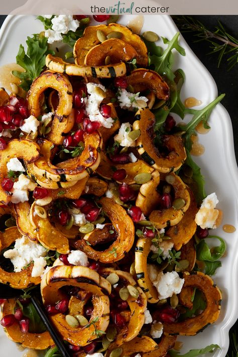 This roasted delicata squash recipe is easy to make and is a great side dish for fall and winter meals.  It's roasted with pumpkin pie spice and thyme, then topped with a delicious combination of sweet, tangy, and savory toppings for some festive holiday flair! Roast Delicata Squash, Butternut Squash Hors D’oeuvres, Butternut Squash Holiday Recipes, How To Cook Delicata Squash, Roasted Delicata Squash Recipe, Delicate Squash Recipes, Squash Side Dish Recipes, Stuffed Delicata Squash Recipe, Pumpkin Recipes Side Dish