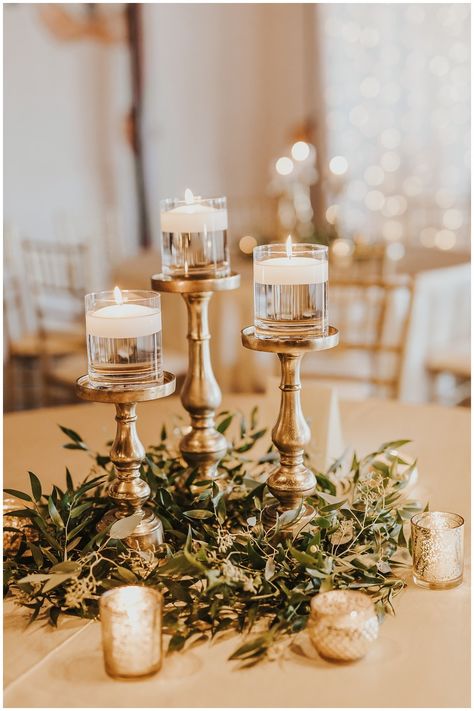 Bronze Centerpieces Wedding, Gold Accent Centerpiece, Gold Candle Wedding Centerpieces, Rustic Gold Wedding Decor, Trendy Wedding Centerpieces, Gold Candle Stick Centerpieces, White And Bronze Wedding Decor, Simple Candlestick Centerpieces Wedding, Mixed Centerpieces Wedding