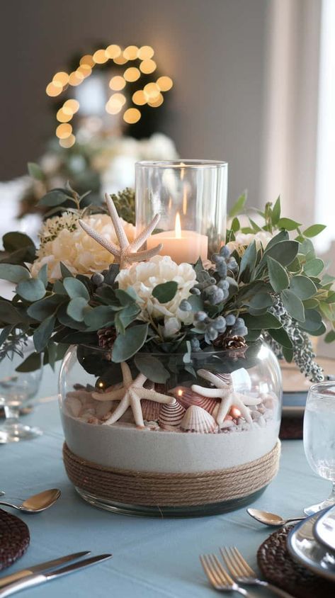 Looking for Christmas decorations centerpiece ideas to wow your guests this holiday season? Discover 22 creative and stylish ideas to decorate your dining table in a festive way! Coastal Dining Room Table Centerpiece, Coastal Christmas Centerpieces, Coastal Christmas Tablescapes, Coastal Dining Room Table, Coastal Table Decor, Minimalist Centerpiece, Best Christmas Decorations, Fruit Centerpieces, Coastal Dining Room