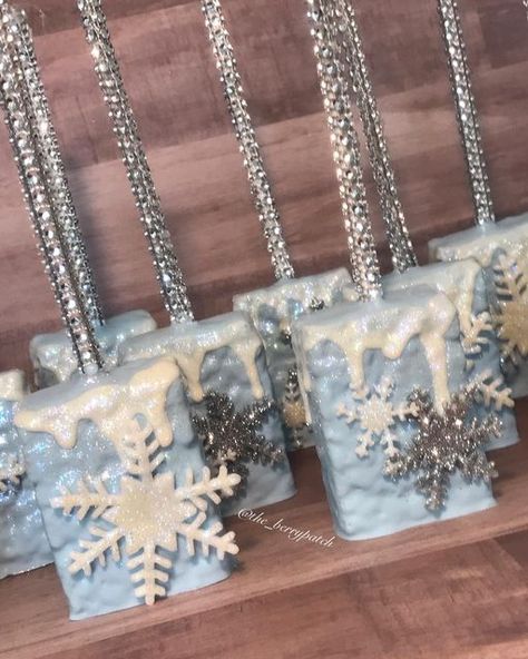 Sweet 16 Party Ideas Winter Theme, Elegant Winter Wonderland Party, Winter Wonderland Snack Table, Winter Wonderland Sweets Table, Snowflake Rice Krispie Treats, Winter In Paris Dance Theme, Sweet 16 Christmas Theme, Winter Wonderland Cake Table, A Snowflake Is On The Way