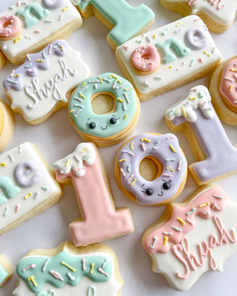 She’s a sweet one!😍🍩✨ • • • #oahuhawaii #honoluluhawaii #birthdaycookies #donutparty #sugarcookieart #sugarcookiesofinstagram Sweet One Birthday Cookies, Sweet One First Birthday Cookies, A Sweet One Birthday Theme, Sweet One Sugar Cookies, Sweet One Cookies First Birthday, She's A Sweet One Birthday Theme, She’s A Sweet One Birthday Theme, Donut Cookies 1st Birthday, Sweet One Cookies