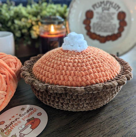 if you enjoy crocheting plushies, you'll love this pumpkin pie free crochet pattern. This crochet food can be used for a pillow, or you can add it to your plush collection. Pumpkin Pie Pillow, Crochet Pie Patterns, Crochet Pumpkin Pie Pillow, Pumpkin Pie Crochet Pattern Free, Small Pumpkin Crochet Pattern Free, Pumpkin Pie Turtle Crochet, Pumpkin Pie Crochet Pattern, Cute Crochet Pumpkin, Fall Crochet Projects Ideas