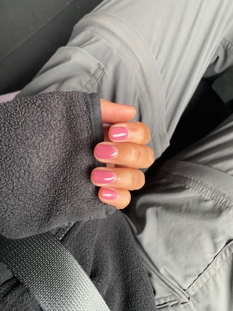 pink jelly nails on hand folded over a black sweater sleeve Clear Pink Jelly Nails, Jelly Watermelon Pink Nails, Hot Pink Jelly Nails, Short Nail Colours, Pink Jelly Nails Acrylic, Pink Polish Nails, Cute Solid Color Nails, Jelly Nails Pink, Short Jelly Nails