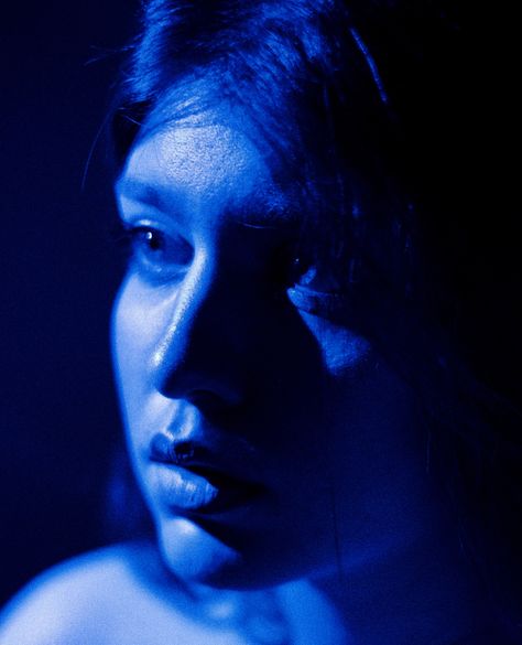 Blue portrait photography of close up female face Cool Tone Portrait, Colored Light Portrait Photography, Blue And Yellow Lighting Photography, Blue Self Portrait, Blue Tint Photography, Blue Toned Photography, Blue Light Photography Portraits, Blue Photography Portrait, Blue Reference Photo