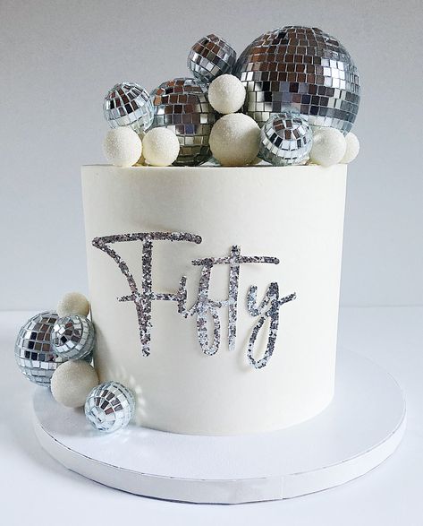 This is one of my favorite cakes that I have made! I think the disco ball theme is so pretty and classy! If you would like your own disco ball themed cake, or another kind of sweet treat, make sure to check out my website and fill out an order form. www.sugarcrumbsllc.com Groovy Disco Cake, Ball Themed Cake, Disco Ball Birthday Cake, Disco Themed Cake, Baby Doll Cake, Disco Ball Theme, Disco Ball Cake, Disco Cake, 30 Cake