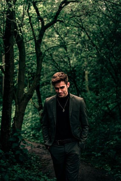 Black Suit Prom, Row Of Trees, Dark Green Shirt, Suit Prom, Forest Theme Wedding, Prom Suit, Suit Combinations, Men's Necklaces, Brown Suit