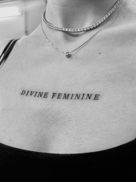 Chest Feminine Tattoo, Text Tattoo On Chest Woman, Divine Feminine Tattoo Collarbone, Simple Chest Tattoos For Women, Small Girly Neck Tattoos, Feminine Sign Tattoo, Divine Chaos Tattoo, Divine Feminine Neck Tattoo, Divine Feminine Art Tattoo