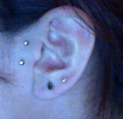 love my sideburn surface piercing :) need more piercings! Sideburn Piercing, Surface Piercing, Piercings, Tatting