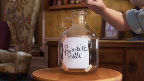 I have a jar like this!  Right now it has a sign on it that says "10th Anniversary", and we're saving all our spare change for the trip we're taking.  -BL Paradise Falls Jar, Fall Jars, Up 2009, Up Pixar, Up The Movie, Paradise Falls, Travel Fund, Honeymoon Fund, Disney Rooms