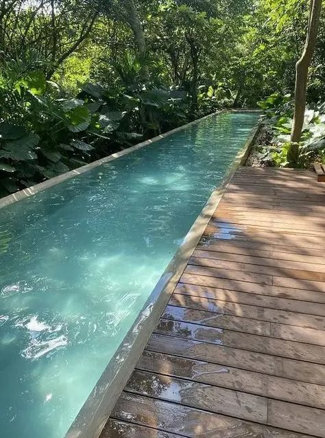 long pool, wooden deck Pool With Wooden Deck, Pool Wood Deck Ideas, Wood Deck Around Pool, Swimming Pool Wooden Deck, Wood Pool Deck Above Ground, Wooden Pool Deck, Wood Pool Deck, Wooden Pool, Contemporary Backyard