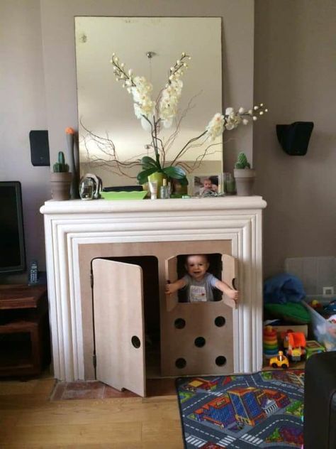 Turn Your Fireplace into a Hut for Kids • Recyclart Repurposed Fireplace, Unused Fireplace, Cardboard Chair, Paint Dipping, Pot Lid Organization, Recycled Plastic Bags, Lid Organizer, Party Flags, Vintage Picture Frames