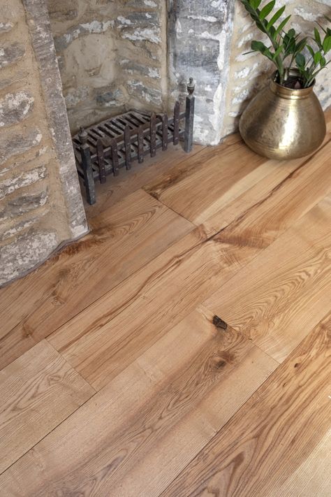 Characterful English ash flooring adds charm to this Cotswold cottage. Oak seemed too dark for this space, so we suggested ash, which is lighter in colour and lighter on the pocket too. Ash Floors, Floor Stone, Ash Flooring, Cotswold Stone, Cotswold Cottage, Stone Farmhouse, Solid Hardwood Floors, Stone Cottage, Hardwood Flooring