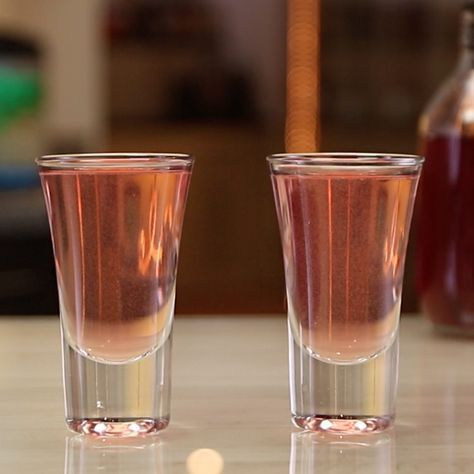 WOO WOO SHOT 1 oz. (30ml) Vodka 1/2 oz. (15ml) Peach Schnapps 1/2 oz (15ml) Cranberry Juice PREPARATION 1. Combine vodka, peach schnapps, and cranberry juice in a shaker with ice. Shake well. 2. Strain mix into a shot glass. DRINK RESPONSIBLY! Peach Schnapps Shots, Shots With Peach Schnapps, Bartender Recipes, Strawberry Cocktail, Pickle Vodka, Shooter Recipes, Summertime Wedding, Shots Alcohol, Vodka Cocktails Recipes