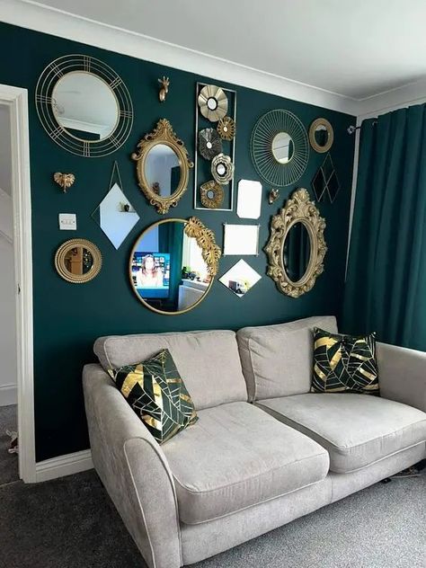 A living room with a green accent wall Mirror And Picture Wall Layout, Mirror Photography Ideas, Wall Decor Living Room Apartment, Moody House, Moody Maximalist, Green Accent Wall, Eclectic Apartment, House Staging, Madrid Apartment