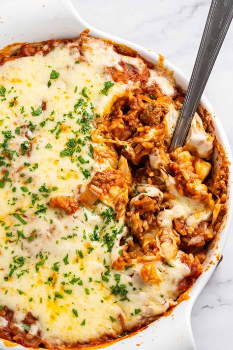 This easy stuffed cabbage casserole recipe is perfect for a quick and tasty dinner. This hassle-free casserole dish tastes just like traditional cabbage rolls, without the fuss. Burger Soup Recipes, Healthier Dinner Ideas, Stuffed Cabbage Casserole, Cabbage Meals, Cheese Burger Soup, Cabbage Casserole Recipe, Burger Soup, Easy Stuffed Cabbage, Cabbage Casserole Recipes