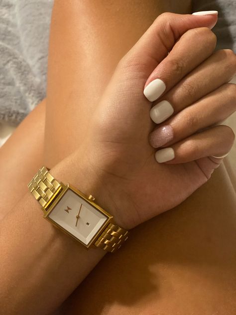 Tan hand and wrist with a gorgeous dainty watch from Mvmt (movement) classy gold watch. White face. Minimalist watch Hoco Nails White, Womens Watches Minimalist, Watches Women Fashion Classy, Mvmt Watches Women, Nails Hoco, Bluelight Glasses, Hoco Nails, Mvmt Watches, Nails Dip